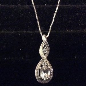 White sapphire sterling silver setting and chain